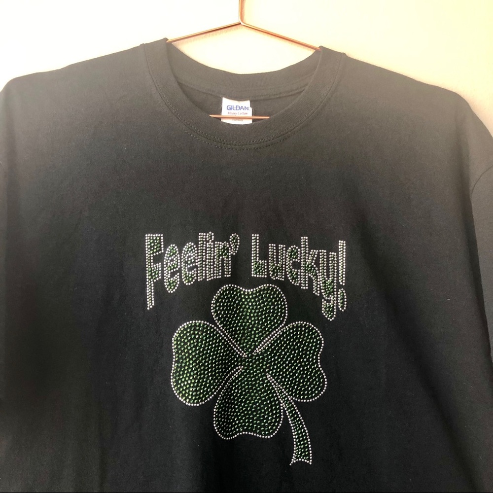 4/$25. Mens “Feelin’ Lucky!” 100% Cotton Short Sleeve Black Graphic Tee.